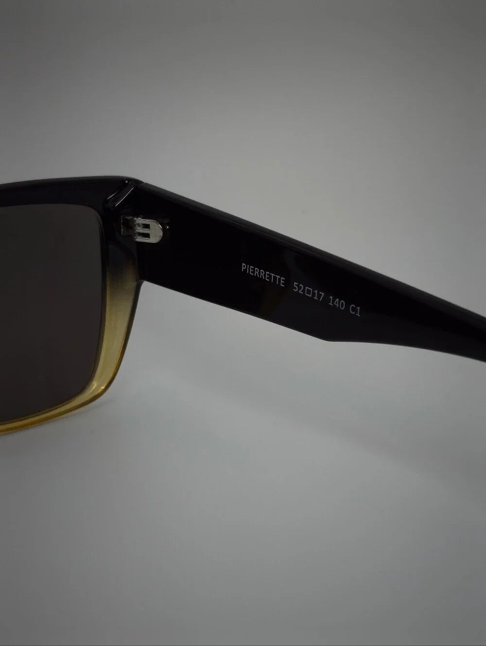 Pierrette. Women's Black to Gold Gradient Cat-Eye Sunglasses.